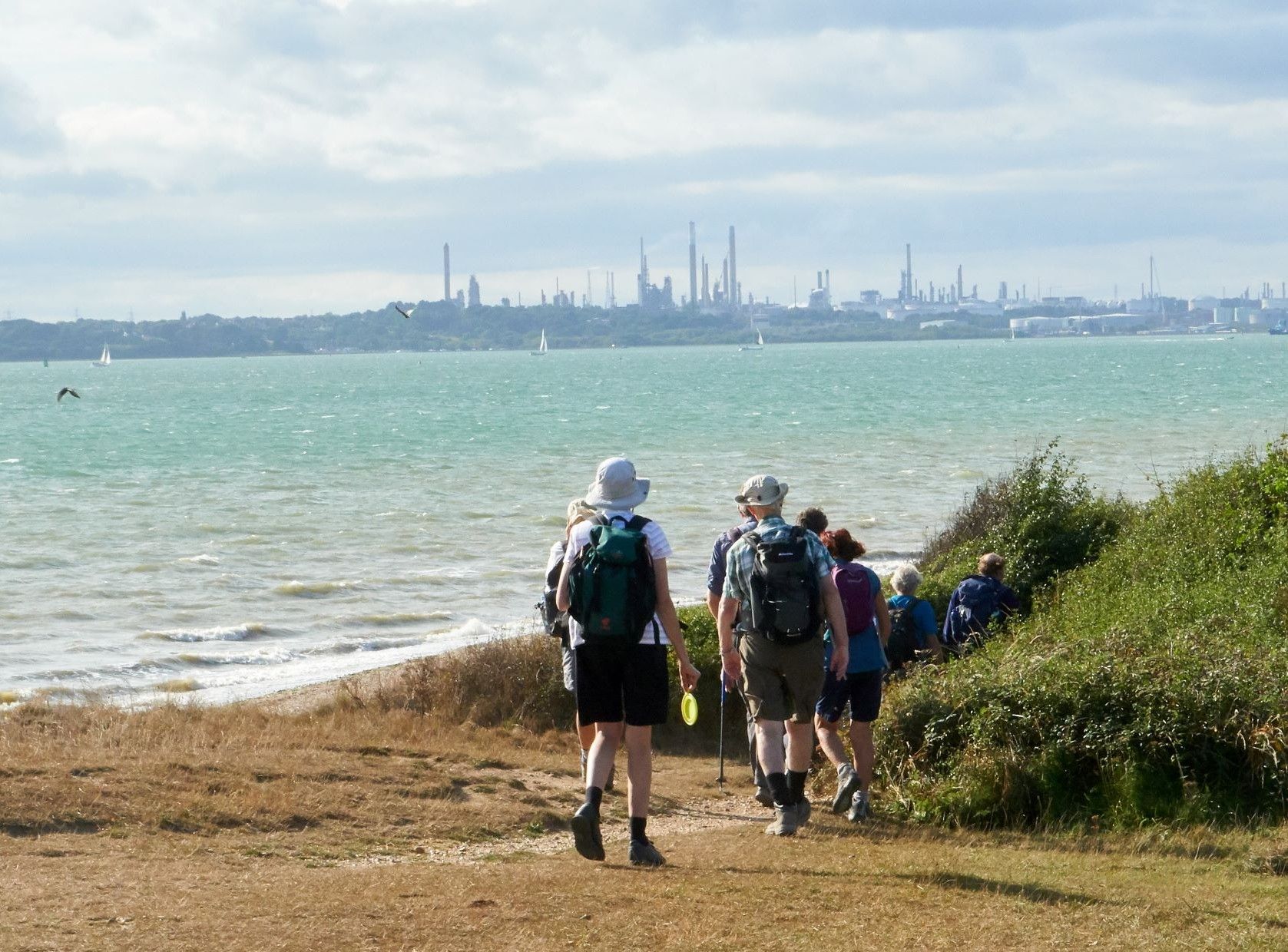 walkers on shoreline